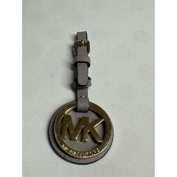 MICHAEL KORS MEDIUM GOLD MK LOGO CHARM WITH STEEL GREY LEATHER HANDBAG - Picture 1 of 11